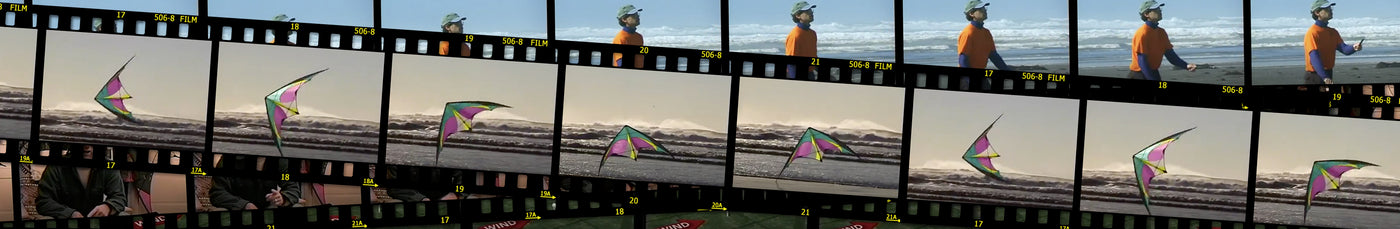 A pile of filmstrips showing a man flying a kite