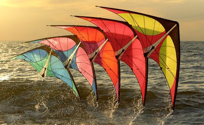 A stack of Nexus stunt kites taking off from the water