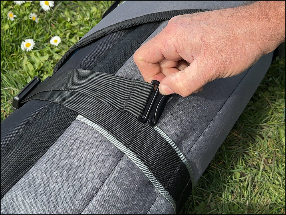 Metal G-hook securing the end of a LaunchPad strap