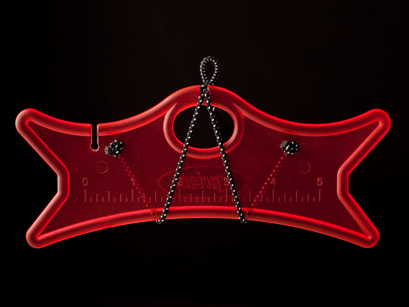 Red dual-line winder on black background