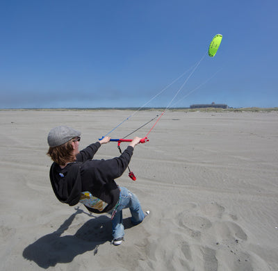 Man on beach flying Mentor 2.5 power kite