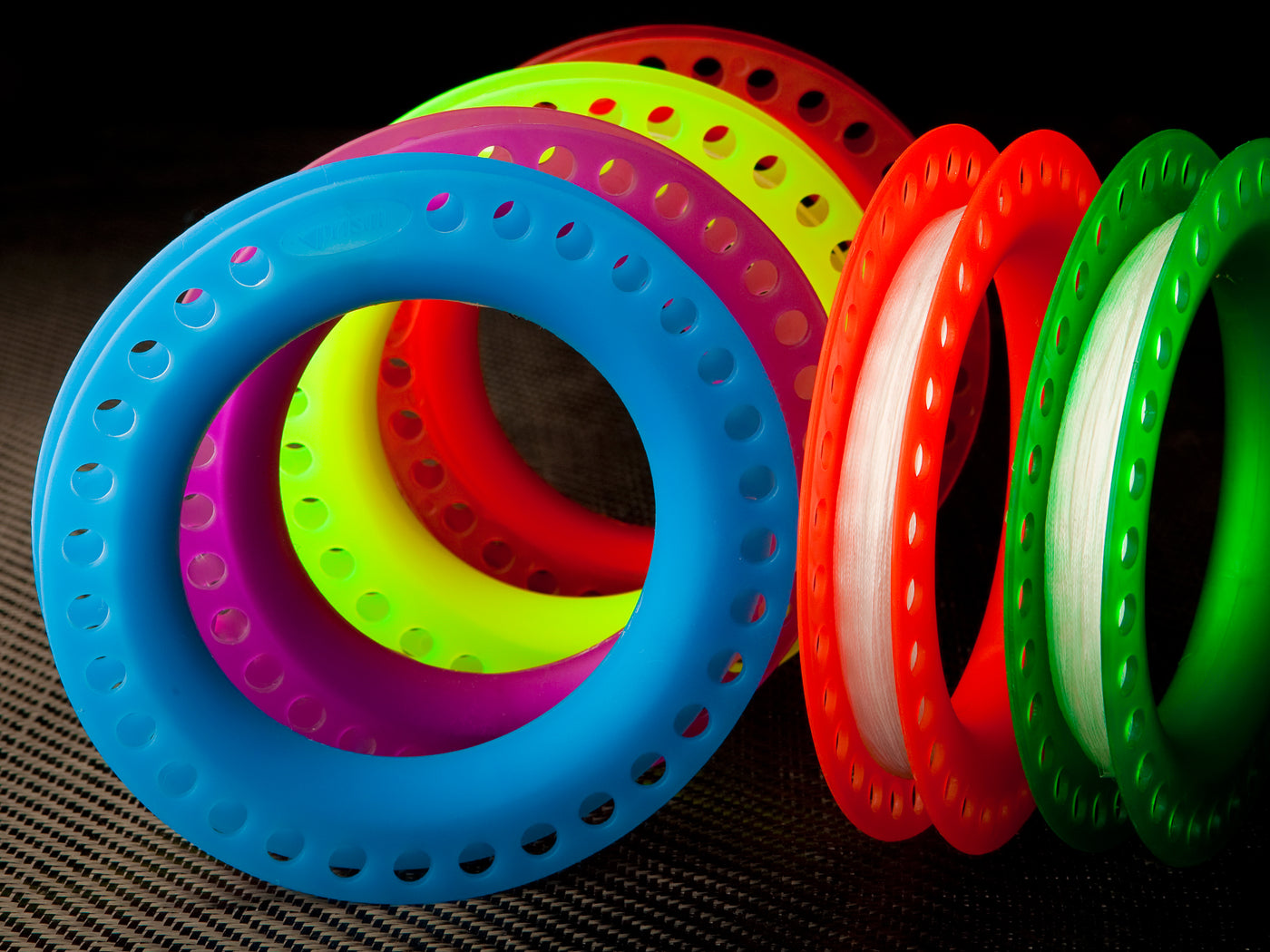 Group of multicolored hoop winders