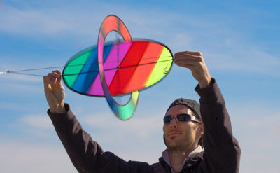 Man launching Flip Kite