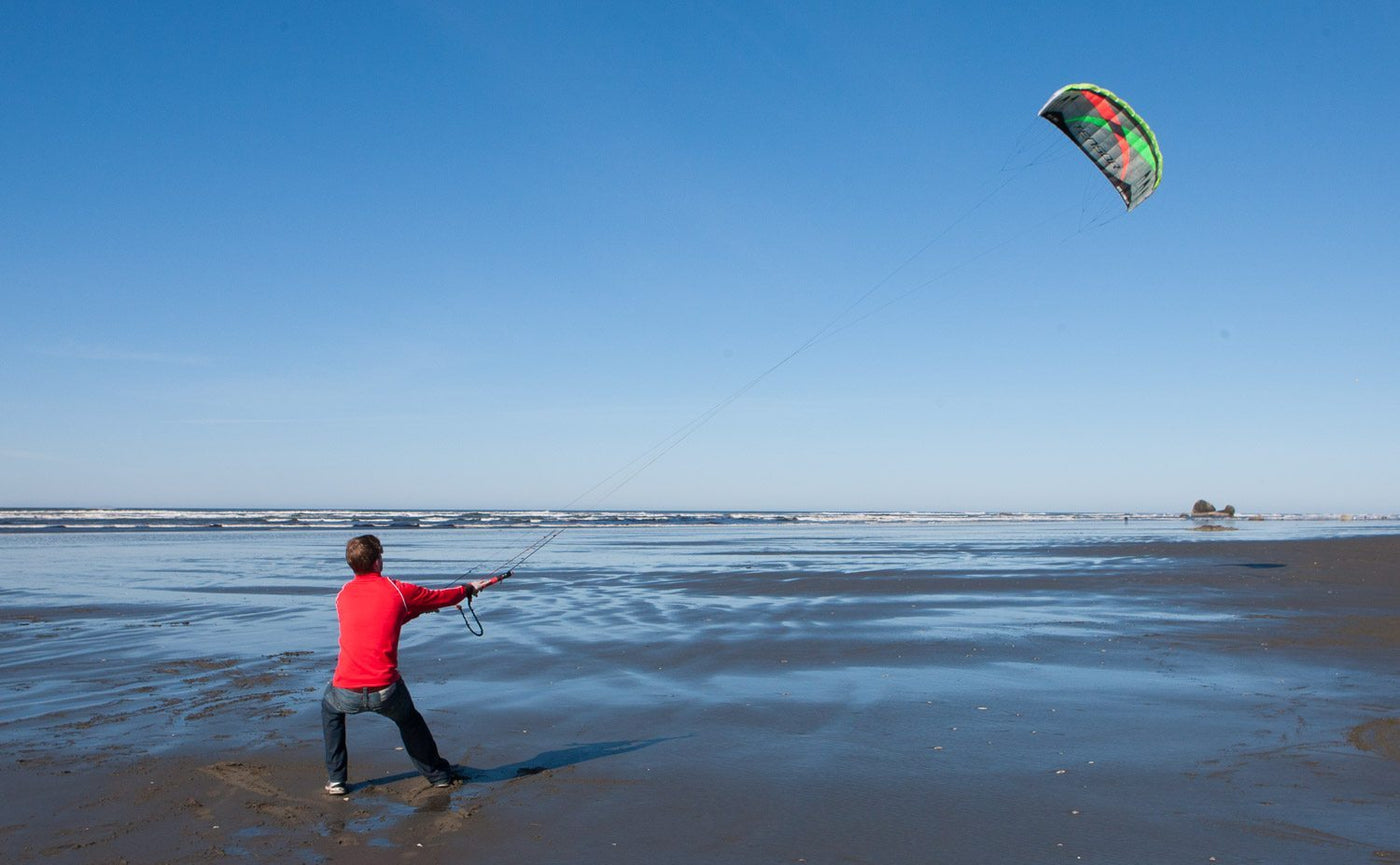 Man flying Tensor power kite on the beach